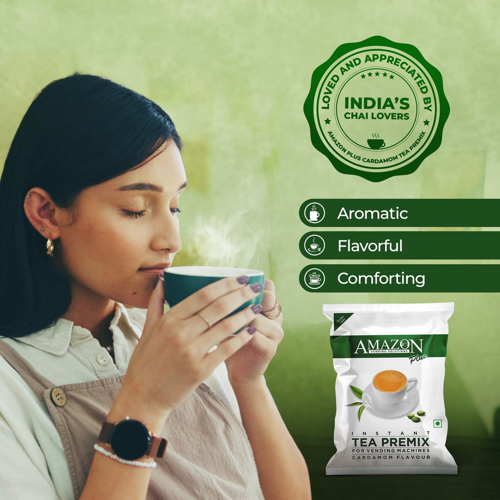 Woman enjoying a hot cup of cardamom tea premix for vending machines with Amazon Plus packaging