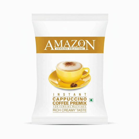 Amazon instant cappuccino powder packet with yellow cup of creamy cappuccino and coffee beans