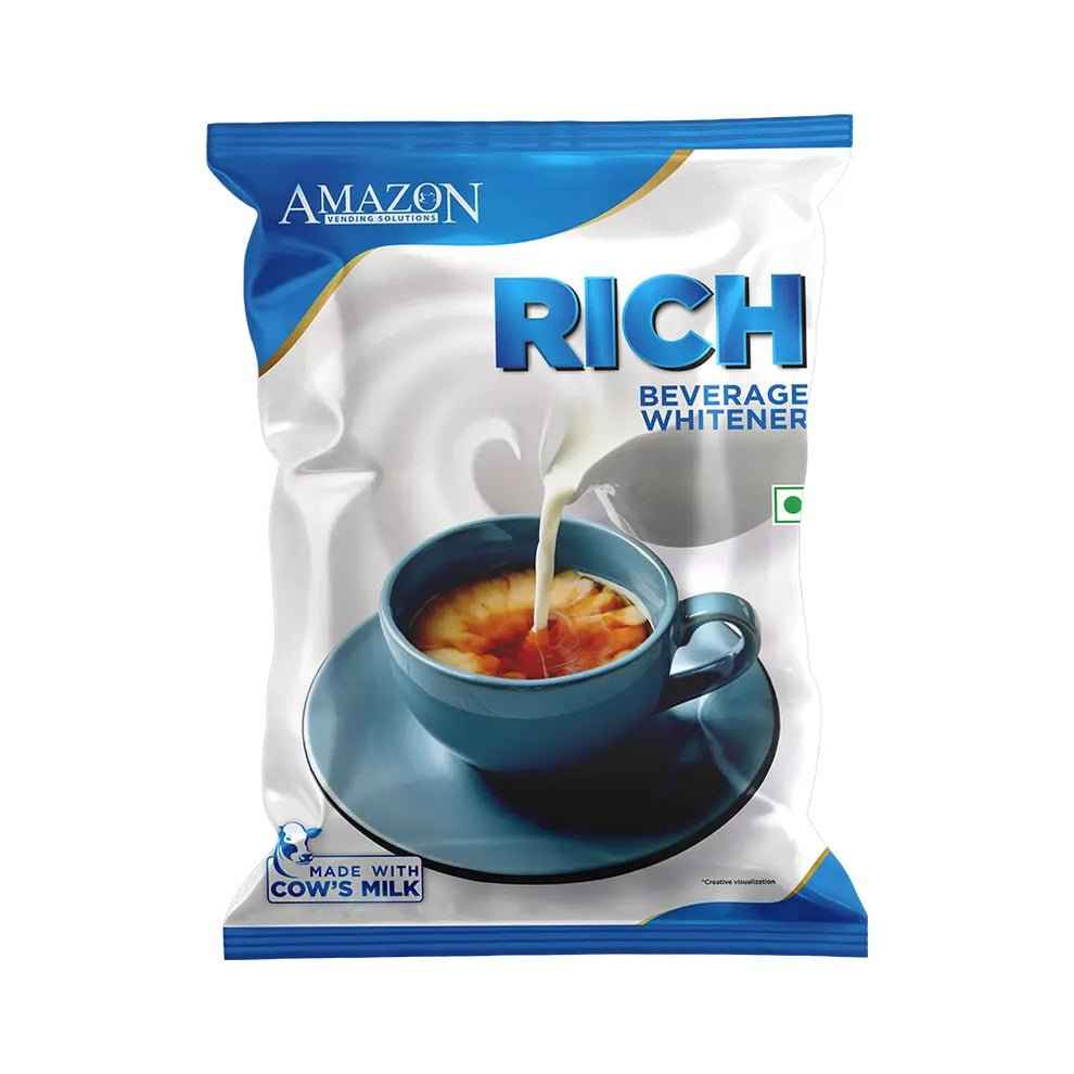 Amazon Rich beverage whitener packet with cow's milk pouring into a cup of tea