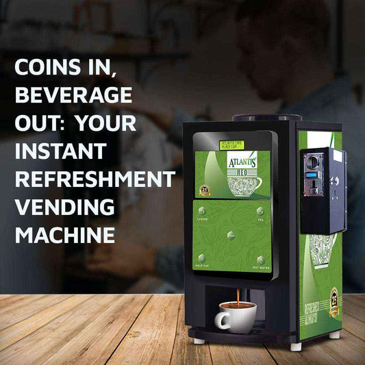 Coin operated coffee vending machine with green and black design dispensing hot coffee into a white cup