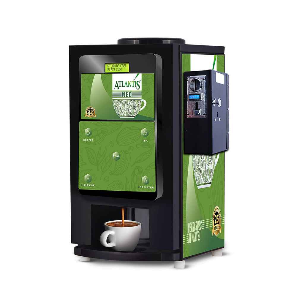 Coin operated coffee vending machine dispensing coffee with green and black design by Tea coffee vending service