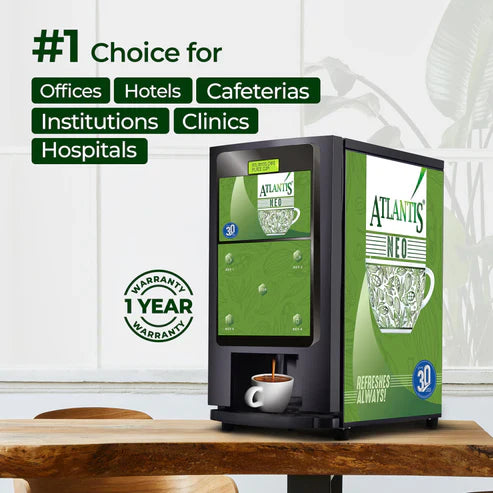 Atlantis Neo 2 coffee vending machine by COFFEE WALLA in black and green on wooden table