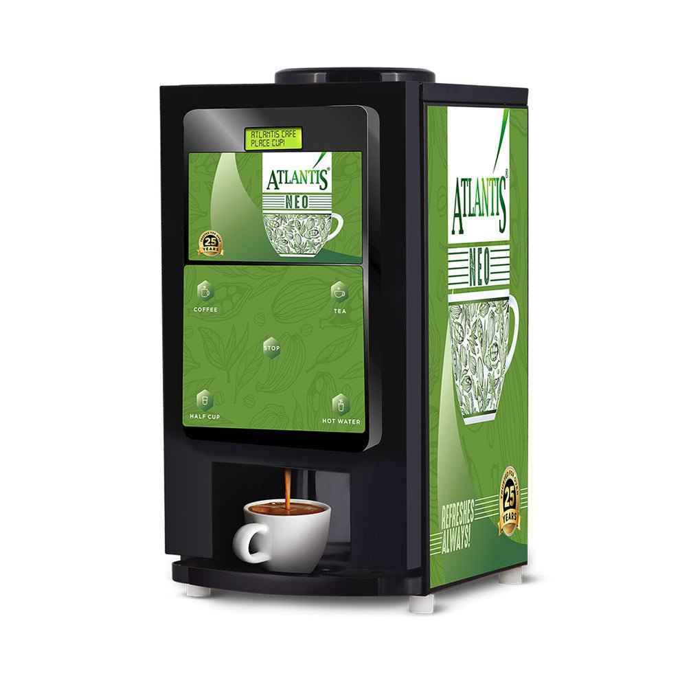 Atlantis Neo vending machine Delhi dispensing a cup of coffee with green and black design