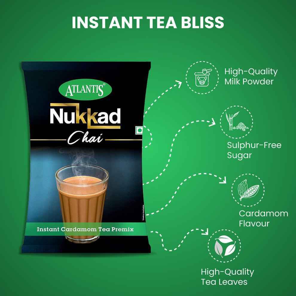 Atlantis Nukkad cardamom chai premix packet with cup of steaming chai and key features listed