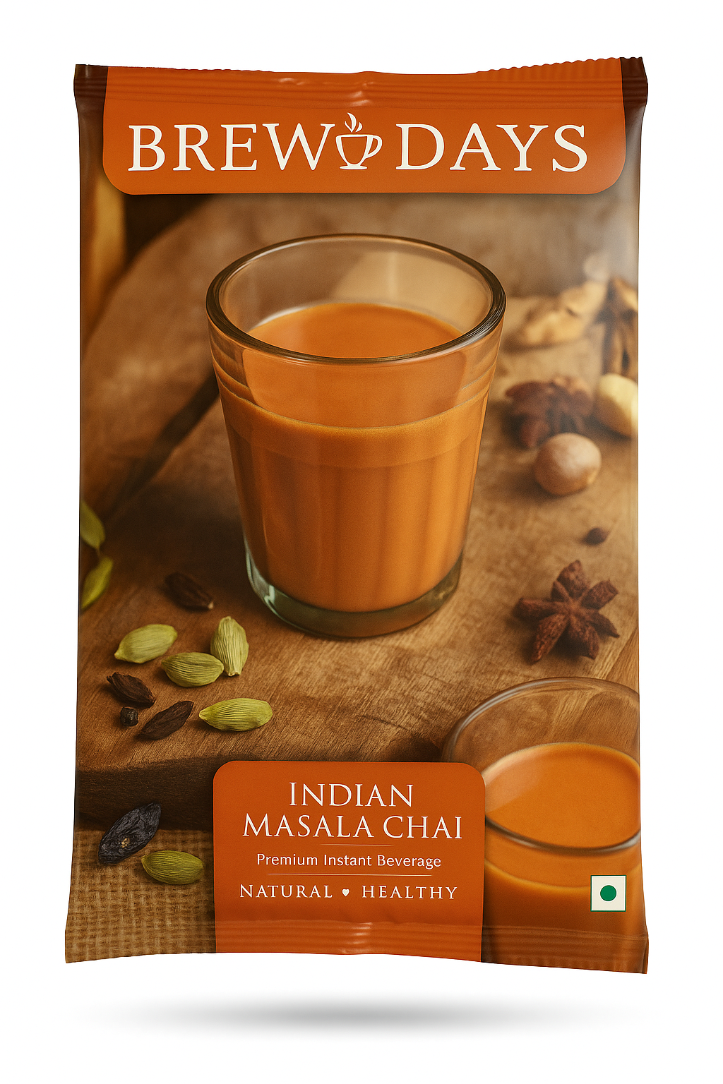 Brew Days Indian masala tea premix packet with glass of spiced tea and aromatic spices on wooden surface