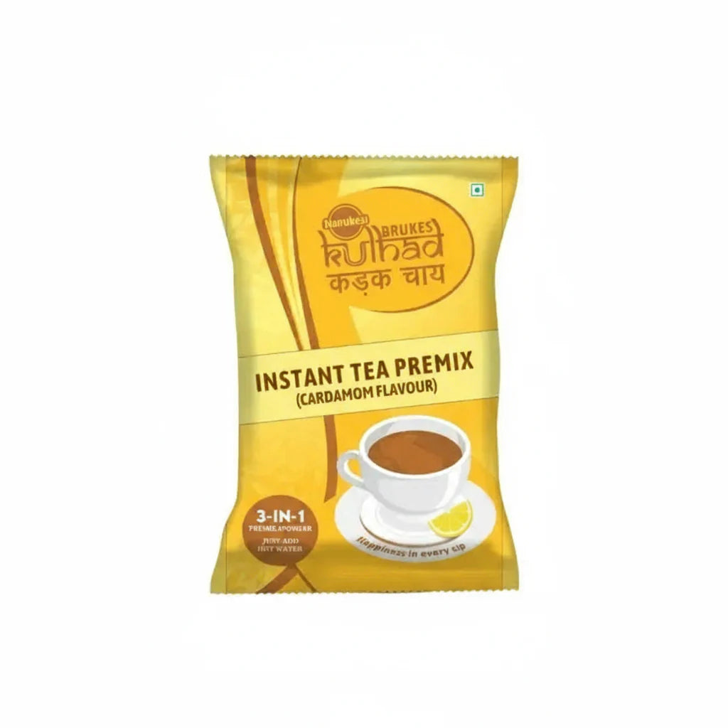 Cardamom instant tea premix by Coffee walla in yellow packaging featuring a cup of tea and lemon slice