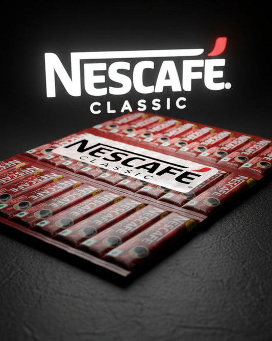 Nescafe Classic instant coffee sachets arranged in a flat pack with Nescafe logo in background