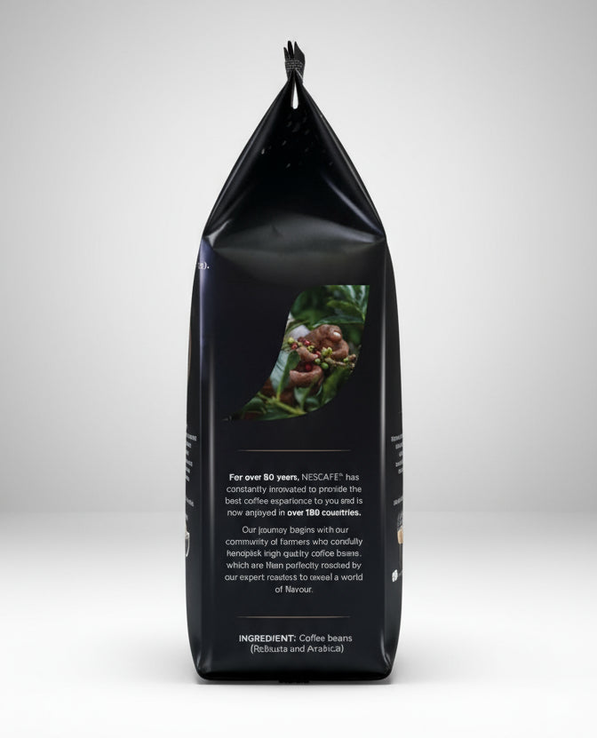 Black bag of Nescafe Intenso coffee beans with product information and coffee plant image on the label