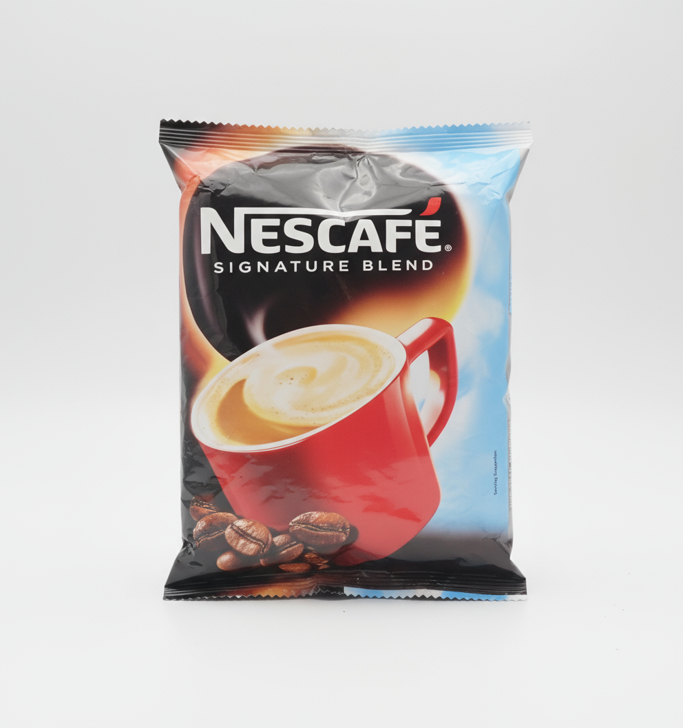 Nescafe Signature Blend 1kg price pack with red coffee cup and coffee beans on the front
