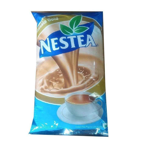 Nestea Masala Gold tea premix packet with image of creamy tea pouring into a cup
