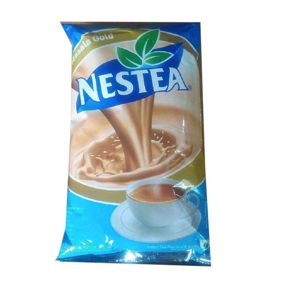Nestea masala tea premix packet with creamy tea splash and cup on blue and gold background