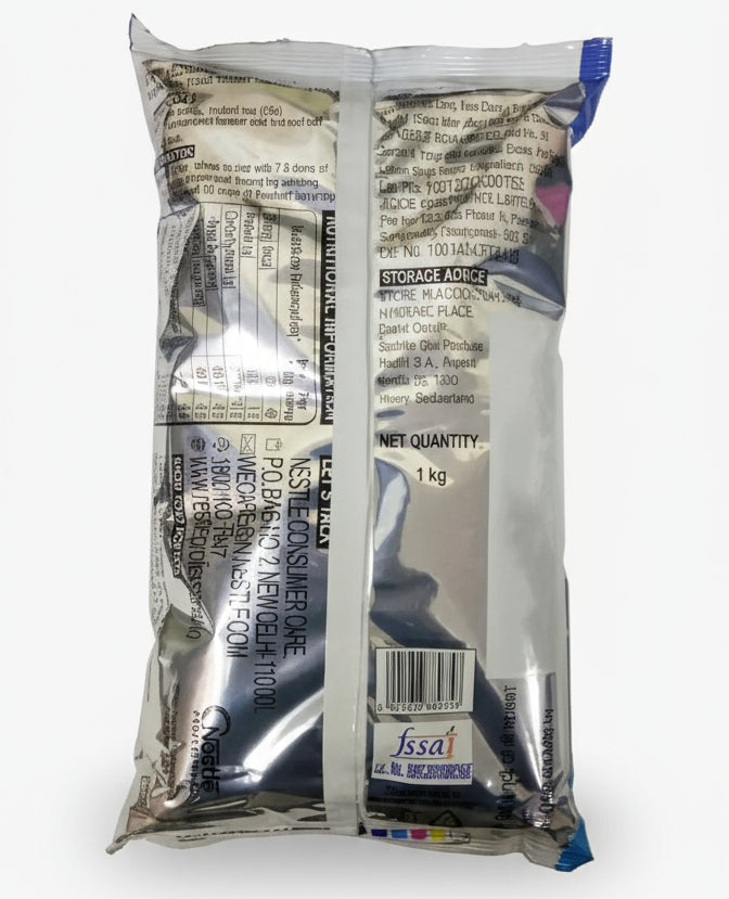 Back view of Coffee walla Nestea cardamom tea premix 1 kg silver packaging with nutritional information